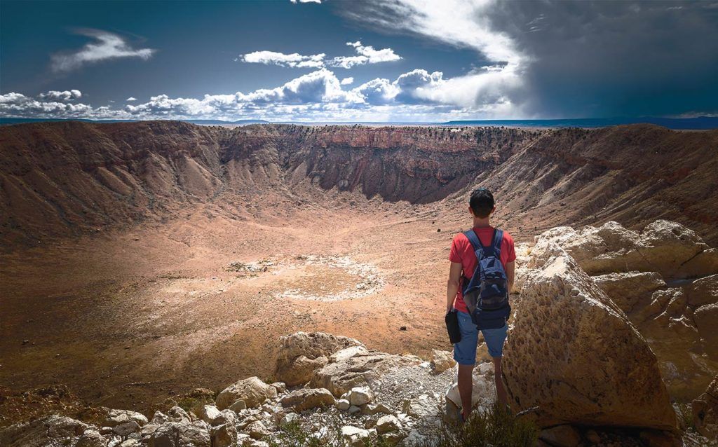 Hiker Overlooking the Meteor Crater